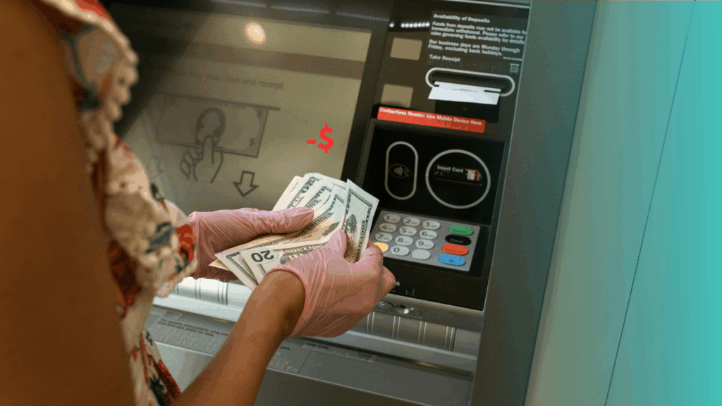 Woman withdrawing cash from a foreign ATM with visible international transaction fees on screen